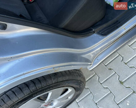 Серый Мицубиси Аутлендер, объемом двигателя 2 л и пробегом 220 тыс. км за 4550 $, фото 13 на Automoto.ua