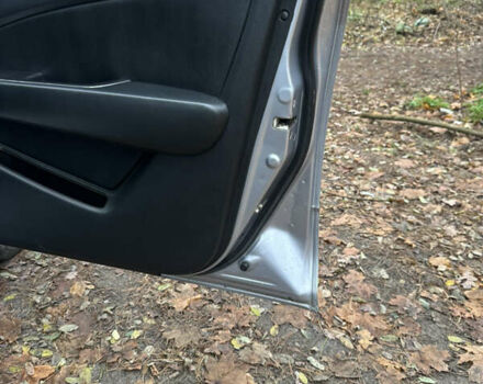 Сірий Міцубісі Аутлендер, об'ємом двигуна 2.38 л та пробігом 303 тис. км за 5200 $, фото 12 на Automoto.ua