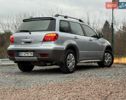Серый Мицубиси Аутлендер, объемом двигателя 2.38 л и пробегом 204 тыс. км за 6990 $, фото 28 на Automoto.ua