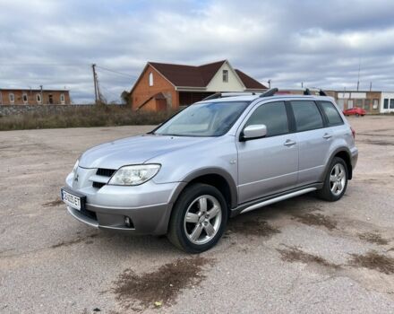 Серый Мицубиси Аутлендер, объемом двигателя 2.4 л и пробегом 264 тыс. км за 6300 $, фото 2 на Automoto.ua