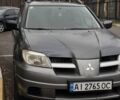 Сірий Міцубісі Аутлендер, об'ємом двигуна 2 л та пробігом 310 тис. км за 5200 $, фото 2 на Automoto.ua