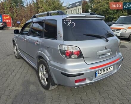 Серый Мицубиси Аутлендер, объемом двигателя 2.4 л и пробегом 243 тыс. км за 6999 $, фото 16 на Automoto.ua