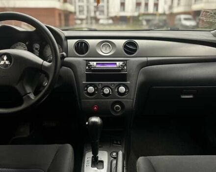 Сірий Міцубісі Аутлендер, об'ємом двигуна 2.4 л та пробігом 98 тис. км за 7199 $, фото 66 на Automoto.ua