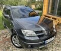 Сірий Міцубісі Аутлендер, об'ємом двигуна 2 л та пробігом 243 тис. км за 5450 $, фото 1 на Automoto.ua