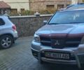 Серый Мицубиси Аутлендер, объемом двигателя 2.38 л и пробегом 180 тыс. км за 6500 $, фото 3 на Automoto.ua