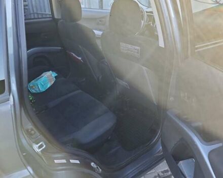 Серый Мицубиси Аутлендер, объемом двигателя 3 л и пробегом 320 тыс. км за 7700 $, фото 6 на Automoto.ua