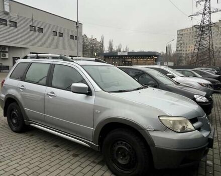 Серый Мицубиси Аутлендер, объемом двигателя 2.4 л и пробегом 179 тыс. км за 7000 $, фото 5 на Automoto.ua