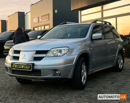 Серый Мицубиси Аутлендер, объемом двигателя 2.4 л и пробегом 231 тыс. км за 8100 $, фото 2 на Automoto.ua