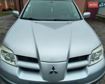 Сірий Міцубісі Аутлендер, об'ємом двигуна 2.4 л та пробігом 98 тис. км за 6800 $, фото 4 на Automoto.ua