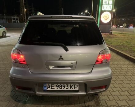 Серый Мицубиси Аутлендер, объемом двигателя 2 л и пробегом 200 тыс. км за 5400 $, фото 6 на Automoto.ua