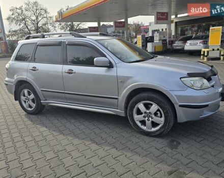 Серый Мицубиси Аутлендер, объемом двигателя 2.4 л и пробегом 243 тыс. км за 6999 $, фото 21 на Automoto.ua