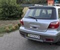 Сірий Міцубісі Аутлендер, об'ємом двигуна 2.38 л та пробігом 137 тис. км за 5500 $, фото 4 на Automoto.ua