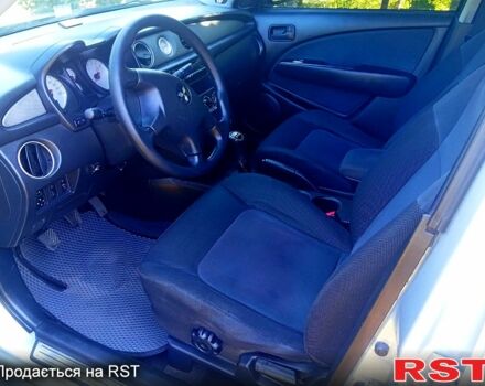 Мицубиси Аутлендер 2006 в Золотоноше на Automoto.ua Серый Мицубиси Аутлендер, объемом двигателя 2 л и пробегом 250 тыс. км за 5500 $, фото 9 на Automoto.ua