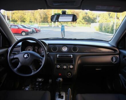 Серый Мицубиси Аутлендер, объемом двигателя 2.4 л и пробегом 200 тыс. км за 8950 $, фото 12 на Automoto.ua