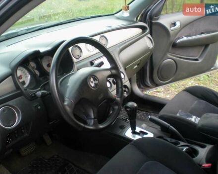 Серый Мицубиси Аутлендер, объемом двигателя 2.4 л и пробегом 235 тыс. км за 6500 $, фото 13 на Automoto.ua