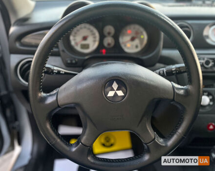 Серый Мицубиси Аутлендер, объемом двигателя 2.4 л и пробегом 231 тыс. км за 8100 $, фото 12 на Automoto.ua