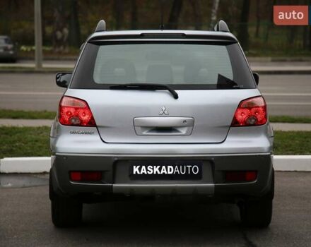 Серый Мицубиси Аутлендер, объемом двигателя 2.4 л и пробегом 171 тыс. км за 8200 $, фото 4 на Automoto.ua