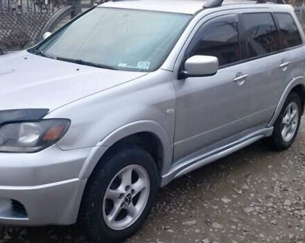 Серый Мицубиси Аутлендер, объемом двигателя 2.4 л и пробегом 261 тыс. км за 5700 $, фото 12 на Automoto.ua
