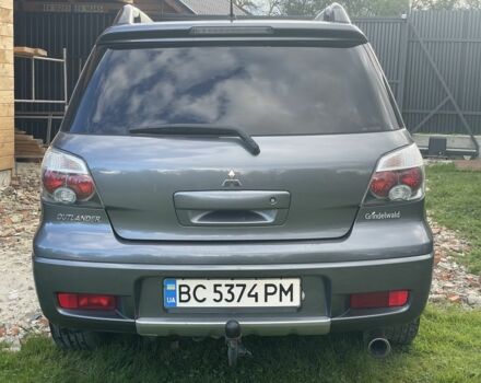 Сірий Міцубісі Аутлендер, об'ємом двигуна 2 л та пробігом 243 тис. км за 5450 $, фото 4 на Automoto.ua