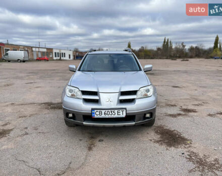 Серый Мицубиси Аутлендер, объемом двигателя 2.4 л и пробегом 264 тыс. км за 6300 $, фото 1 на Automoto.ua