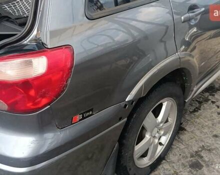 Серый Мицубиси Аутлендер, объемом двигателя 2.38 л и пробегом 600 тыс. км за 5700 $, фото 10 на Automoto.ua