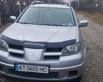 Серый Мицубиси Аутлендер, объемом двигателя 2.4 л и пробегом 261 тыс. км за 5700 $, фото 7 на Automoto.ua