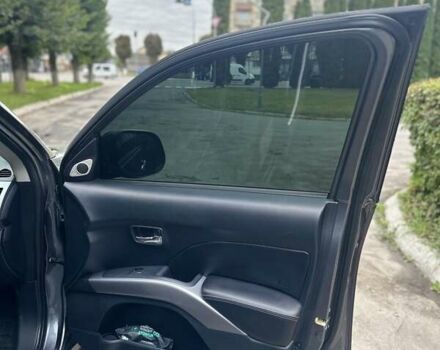 Серый Мицубиси Аутлендер, объемом двигателя 2 л и пробегом 250 тыс. км за 9300 $, фото 10 на Automoto.ua