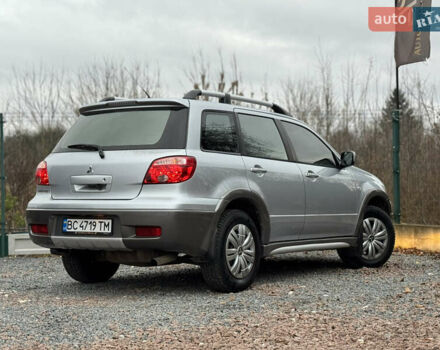 Серый Мицубиси Аутлендер, объемом двигателя 2.38 л и пробегом 204 тыс. км за 6990 $, фото 36 на Automoto.ua