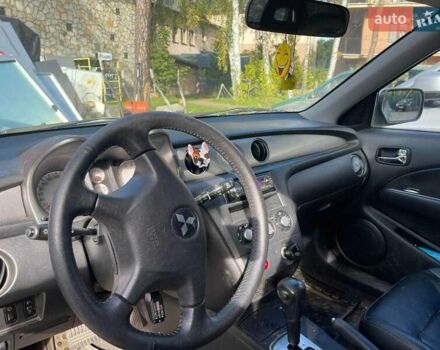 Серый Мицубиси Аутлендер, объемом двигателя 2.4 л и пробегом 127 тыс. км за 4400 $, фото 4 на Automoto.ua