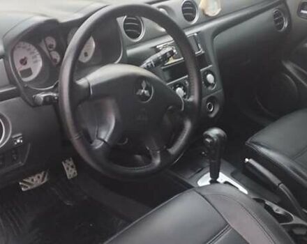 Серый Мицубиси Аутлендер, объемом двигателя 2.4 л и пробегом 261 тыс. км за 5700 $, фото 35 на Automoto.ua