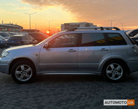 Серый Мицубиси Аутлендер, объемом двигателя 2.4 л и пробегом 231 тыс. км за 8100 $, фото 3 на Automoto.ua