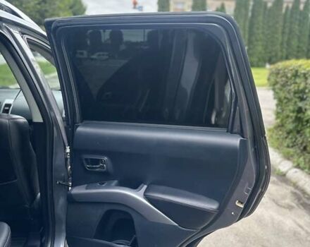 Серый Мицубиси Аутлендер, объемом двигателя 2 л и пробегом 250 тыс. км за 9300 $, фото 11 на Automoto.ua