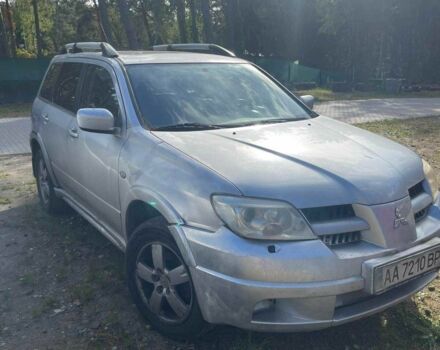 Серый Мицубиси Аутлендер, объемом двигателя 2.4 л и пробегом 127 тыс. км за 4400 $, фото 2 на Automoto.ua
