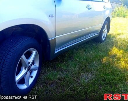 Мицубиси Аутлендер 2006 в Золотоноше на Automoto.ua Серый Мицубиси Аутлендер, объемом двигателя 2 л и пробегом 250 тыс. км за 5500 $, фото 2 на Automoto.ua