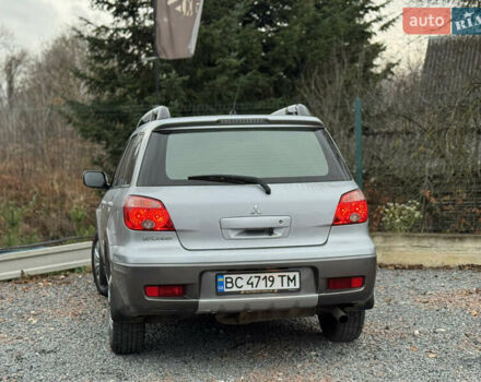 Серый Мицубиси Аутлендер, объемом двигателя 2.38 л и пробегом 204 тыс. км за 6990 $, фото 33 на Automoto.ua