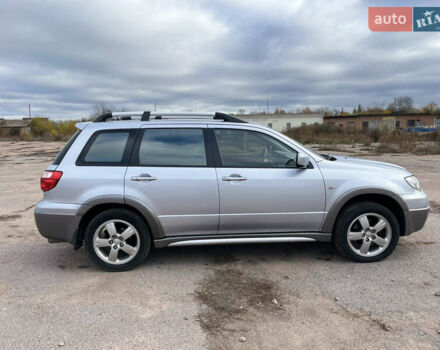 Серый Мицубиси Аутлендер, объемом двигателя 2.4 л и пробегом 264 тыс. км за 6300 $, фото 7 на Automoto.ua