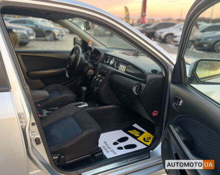 Серый Мицубиси Аутлендер, объемом двигателя 2.4 л и пробегом 231 тыс. км за 8100 $, фото 18 на Automoto.ua