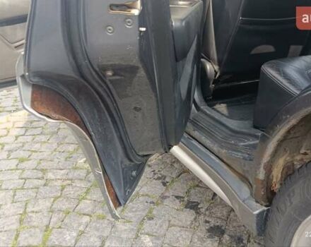 Серый Мицубиси Аутлендер, объемом двигателя 2.38 л и пробегом 600 тыс. км за 5700 $, фото 15 на Automoto.ua