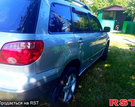 Мицубиси Аутлендер 2006 в Золотоноше на Automoto.ua Серый Мицубиси Аутлендер, объемом двигателя 2 л и пробегом 250 тыс. км за 5500 $, фото 4 на Automoto.ua