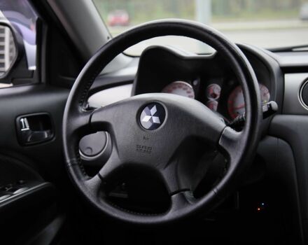 Серый Мицубиси Аутлендер, объемом двигателя 2.4 л и пробегом 171 тыс. км за 8200 $, фото 13 на Automoto.ua