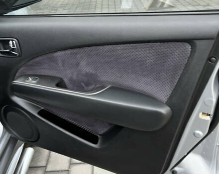 Серый Мицубиси Аутлендер, объемом двигателя 2.38 л и пробегом 180 тыс. км за 6000 $, фото 21 на Automoto.ua