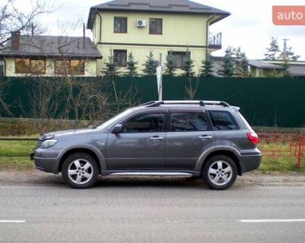 Серый Мицубиси Аутлендер, объемом двигателя 2.4 л и пробегом 235 тыс. км за 6500 $, фото 4 на Automoto.ua