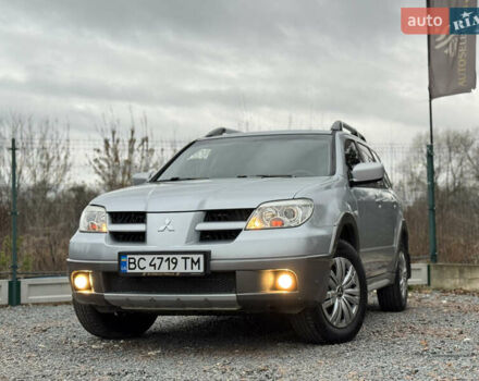 Серый Мицубиси Аутлендер, объемом двигателя 2.38 л и пробегом 204 тыс. км за 6990 $, фото 41 на Automoto.ua