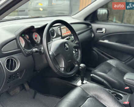 Серый Мицубиси Аутлендер, объемом двигателя 2.38 л и пробегом 204 тыс. км за 6990 $, фото 5 на Automoto.ua