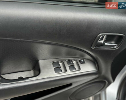 Серый Мицубиси Аутлендер, объемом двигателя 2.38 л и пробегом 204 тыс. км за 6990 $, фото 4 на Automoto.ua