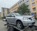 Серый Мицубиси Аутлендер, объемом двигателя 2 л и пробегом 220 тыс. км за 2028 $, фото 1 на Automoto.ua