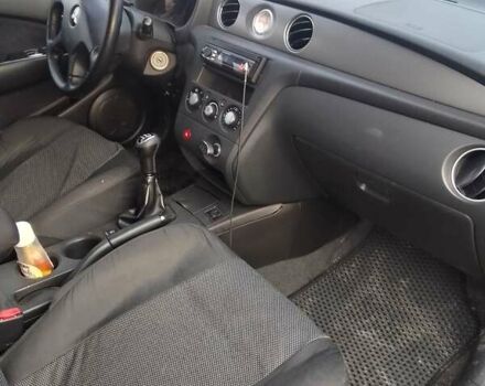 Серый Мицубиси Аутлендер, объемом двигателя 2 л и пробегом 154 тыс. км за 6500 $, фото 6 на Automoto.ua