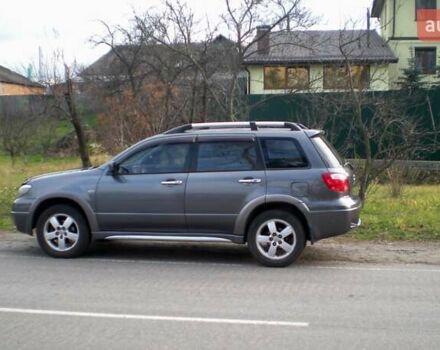 Серый Мицубиси Аутлендер, объемом двигателя 2.4 л и пробегом 235 тыс. км за 6500 $, фото 17 на Automoto.ua