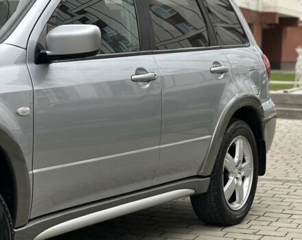 Сірий Міцубісі Аутлендер, об'ємом двигуна 2.4 л та пробігом 98 тис. км за 7199 $, фото 14 на Automoto.ua