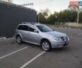 Серый Мицубиси Аутлендер, объемом двигателя 2.4 л и пробегом 200 тыс. км за 8650 $, фото 1 на Automoto.ua